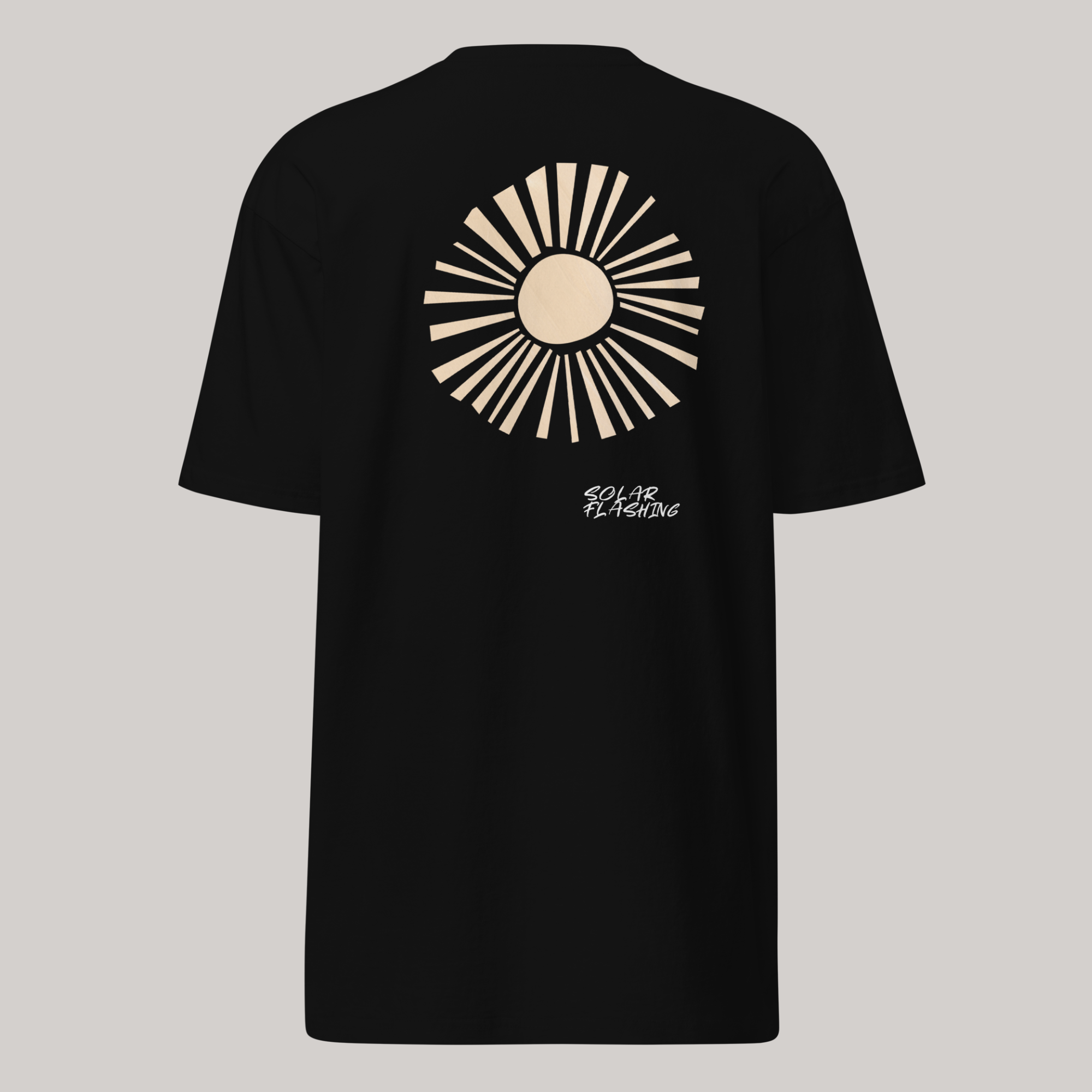 back of black graphic tee with sun graphic and 'solar flashing' embroidered text on bottom right of black graphic tee