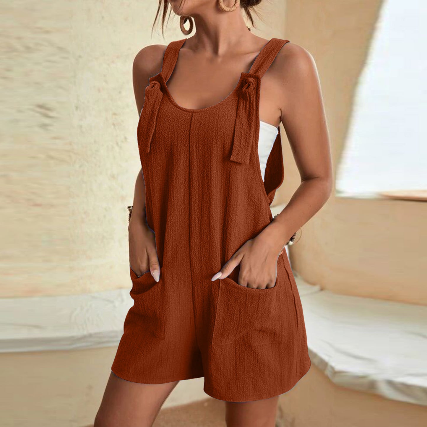 A brown jumpsuit for women in casual jumpsuit style; summer collection item 