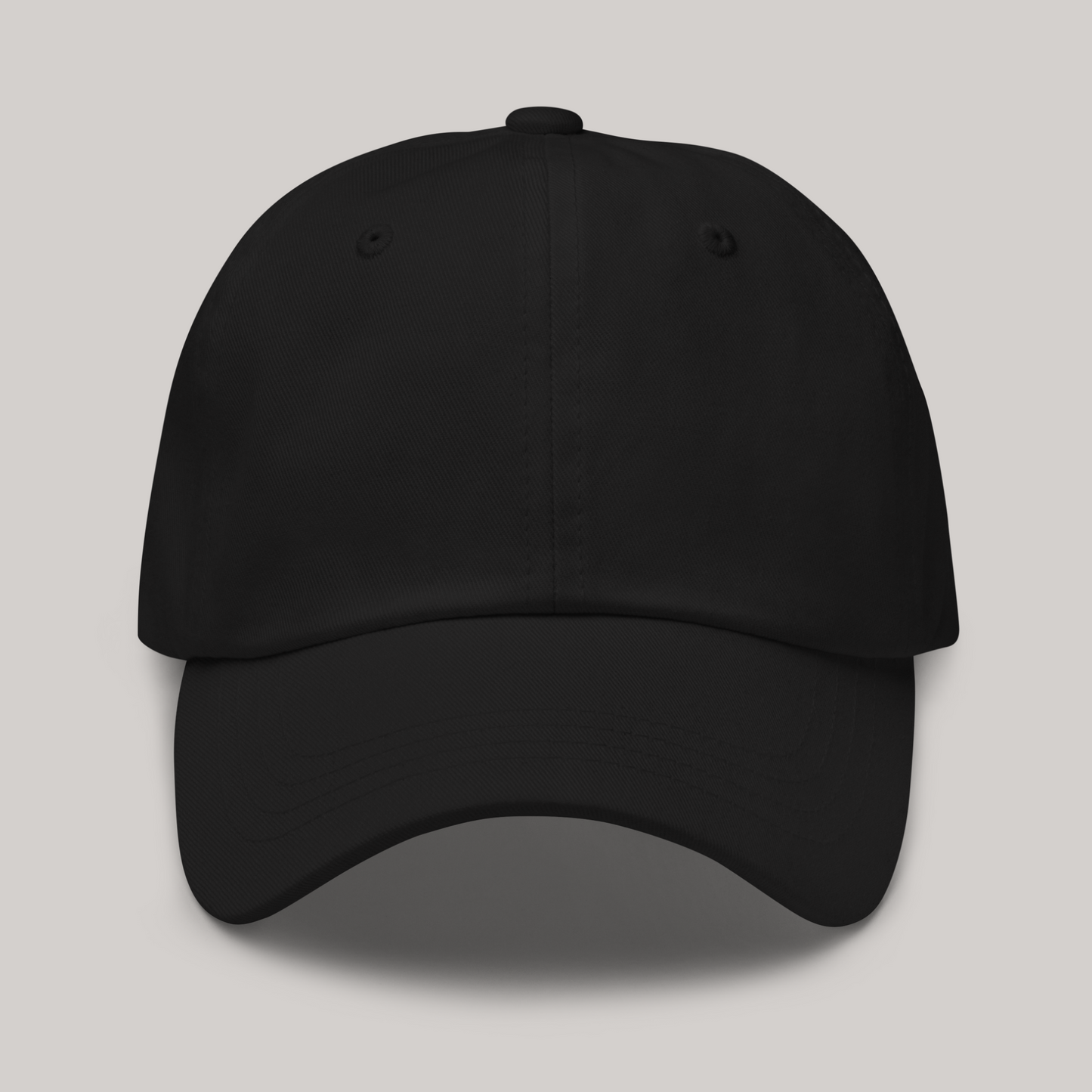 Front side of cap: classic baseball dad hat. Curved visor, 6 panels, full black + back embroidery 'cosmic vision'