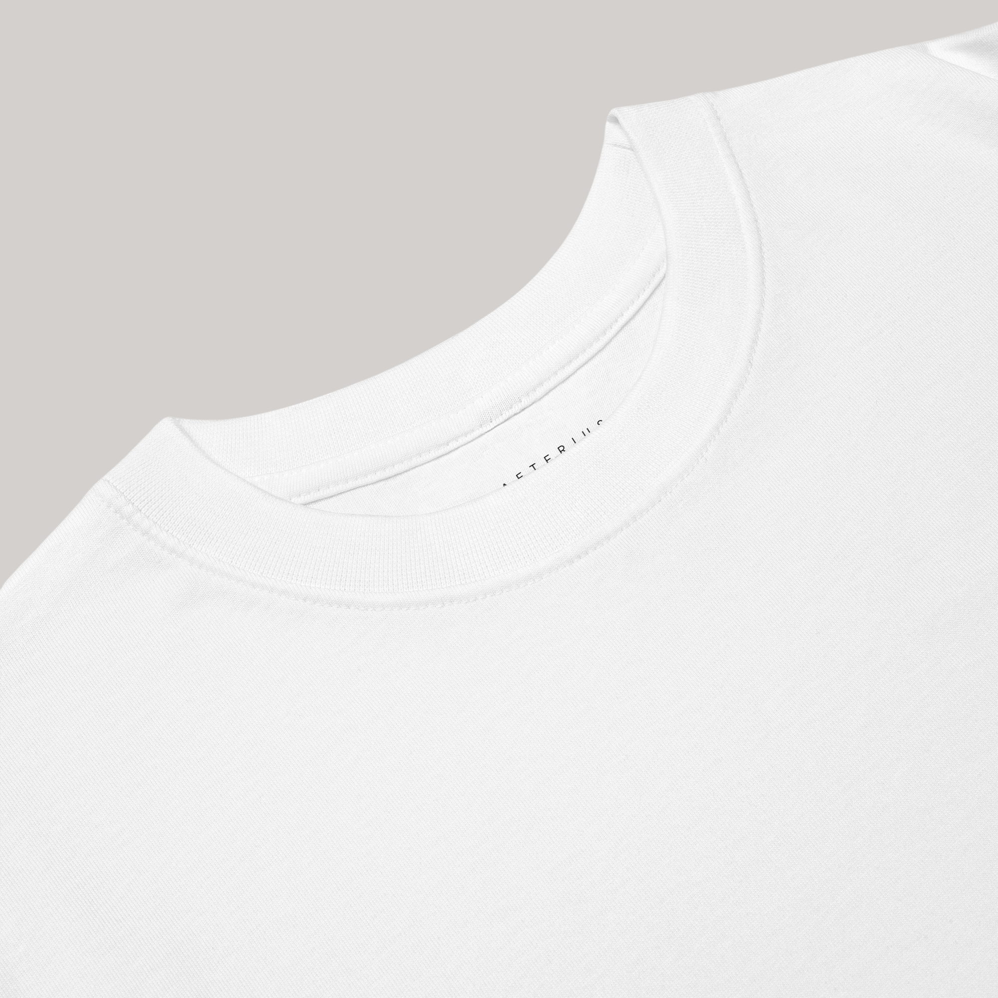 Solid Minds t-shirt details; Aeterius logo tear away tag- round crew heavyweight tee unisex zoomed in