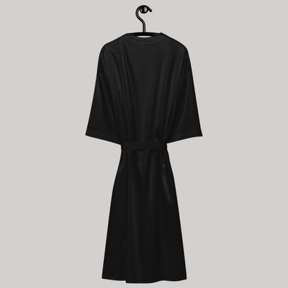 Back side of black satin kimono robe, hanging demonstration. Tied closed. 