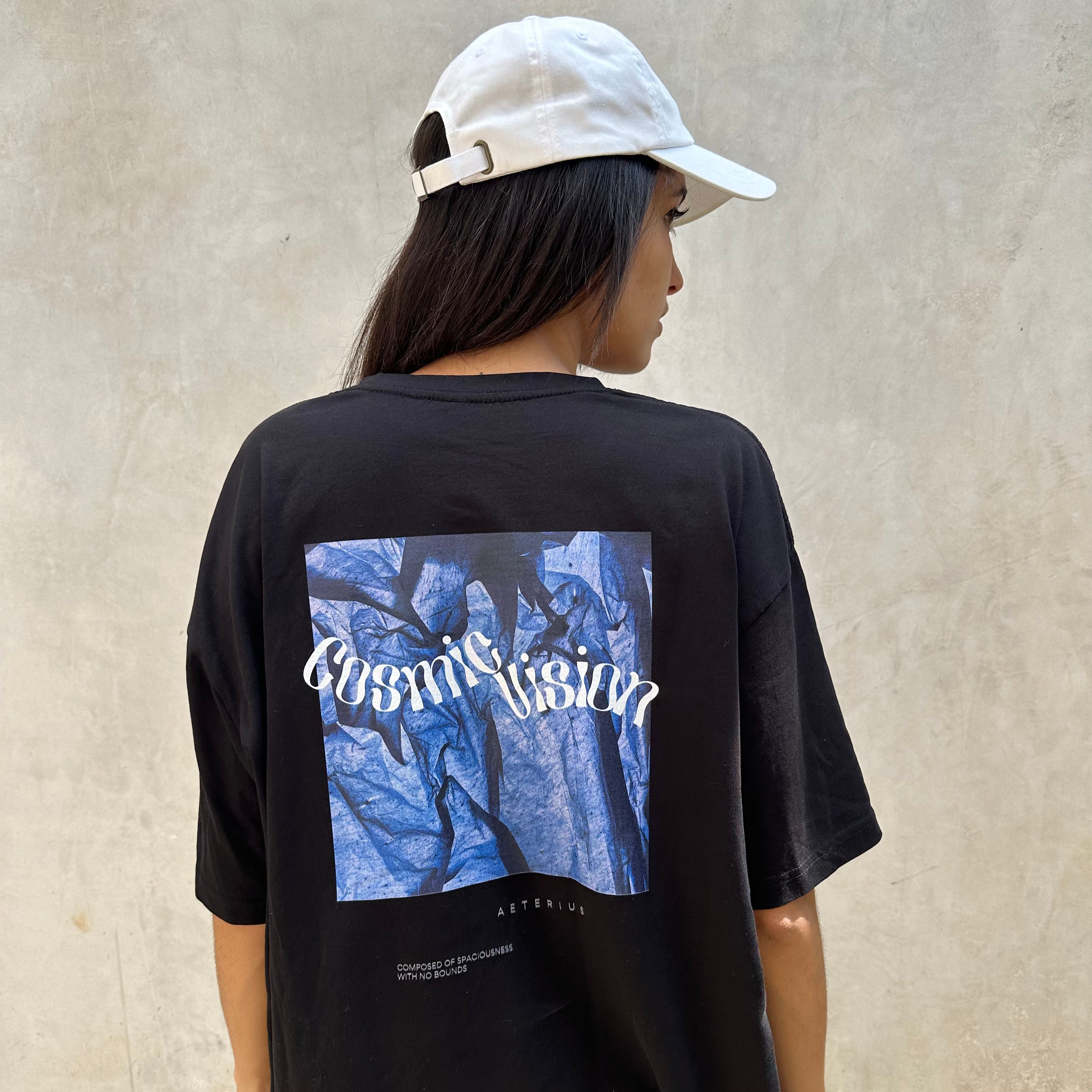 black and blue graphic tee, luxury streetwear, AETERIUS, black t-shirt, oversized, cosmic vision, white baseball cap dad hat