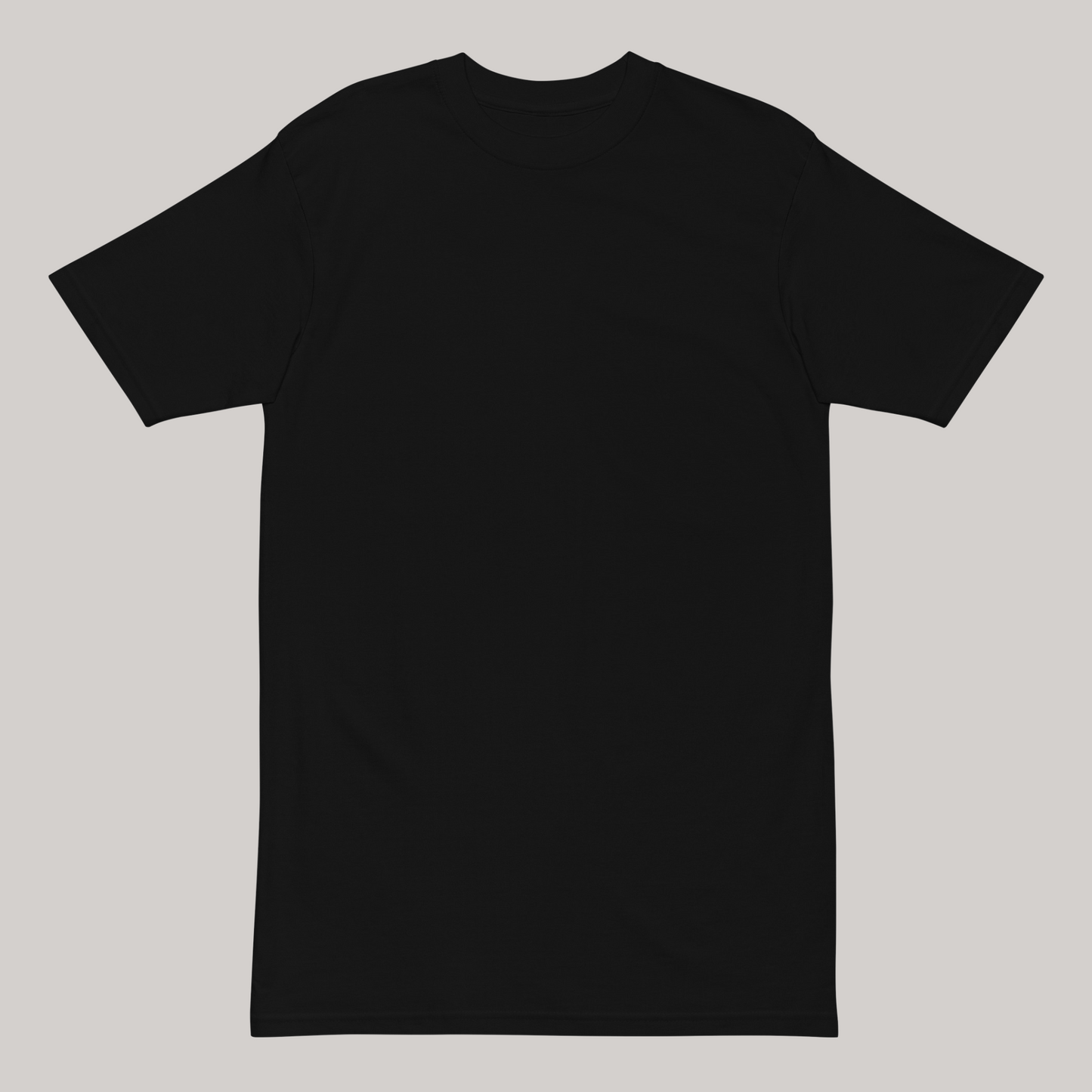 Front side of Oscillating T-Shirt, full black garment. Dropped shoulders, oversized. 100% combed ring-spun luxury cotton