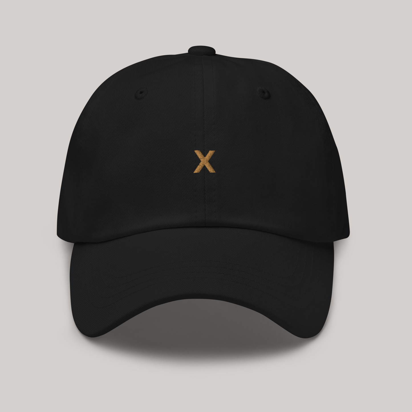 The X Gold Cap Dad Hat AETERIUS WEAR Luxury Streetwear front side