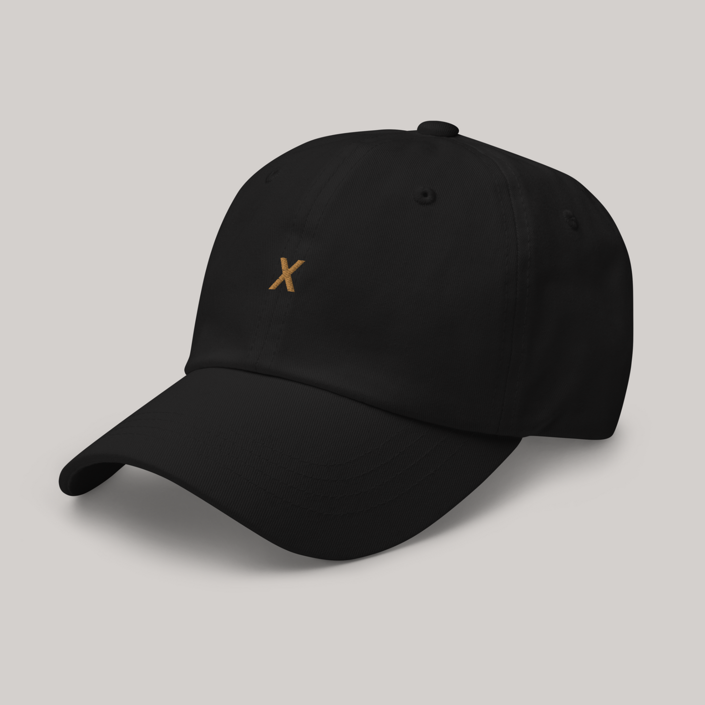 The X Gold Cap Dad Hat AETERIUS WEAR Luxury Streetwear side front