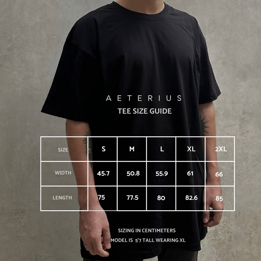 black t-shirt size guide table grid in centimeters by AETERIUS