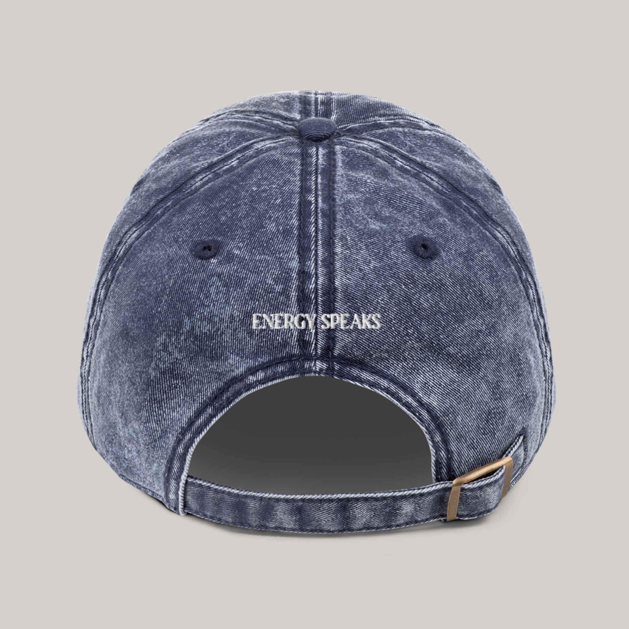 Back side of cap: cotton twill, washed out vintage denim look, 'energy speaks' back embroidery. Strap closed