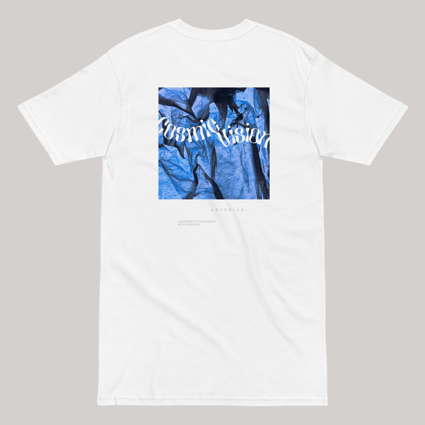 mens or womens oversized white and blue t-shirt, a graphic tee's back design: 'cosmic vision' purple, blue and black patterns with minimalistic text underneath